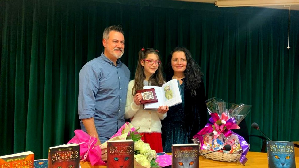 Eva Ramos junto con su padre y madre